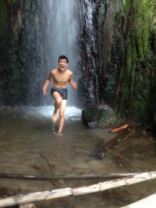 Swimming under the waterfall (1)