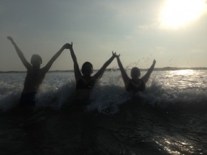 Silhouetted group photo in the waves (1)