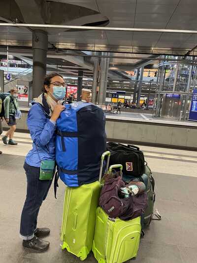 A very tired Kate standing with all our bags at the Hauptbahnhof
