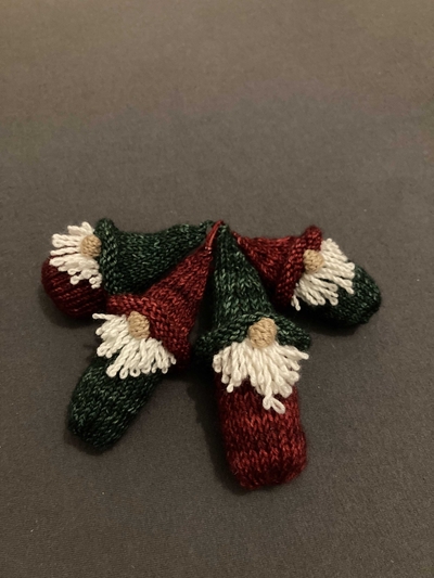 4 knitted gnomes
