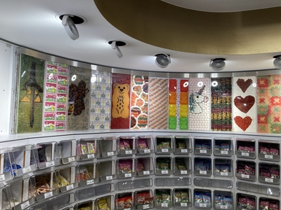 HARIBO store self-serve section and gummy murals
