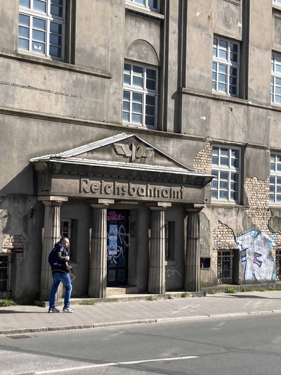 Building with the German word  Reichsbahnamt carved above the door