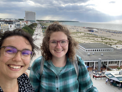 Veronica and Kate took a selfie in the lighthouse with the beech and costal walkway in the background