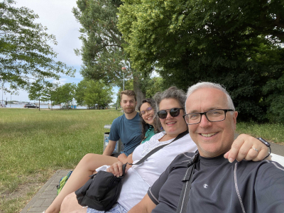 The family waiting for the Gehlsdorf ferry on a bench